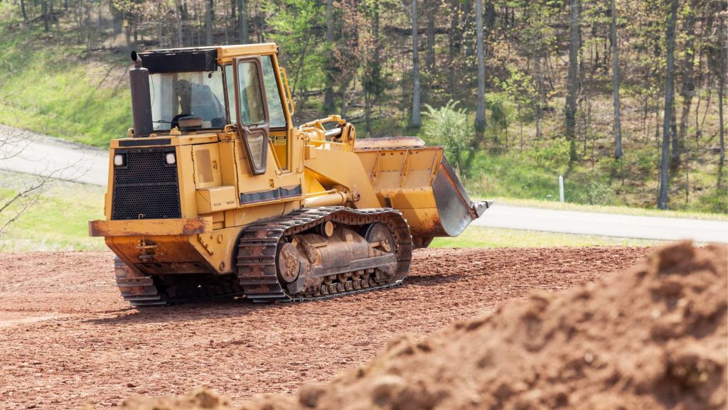 Excavator clearing land in Huntsville, Alabama