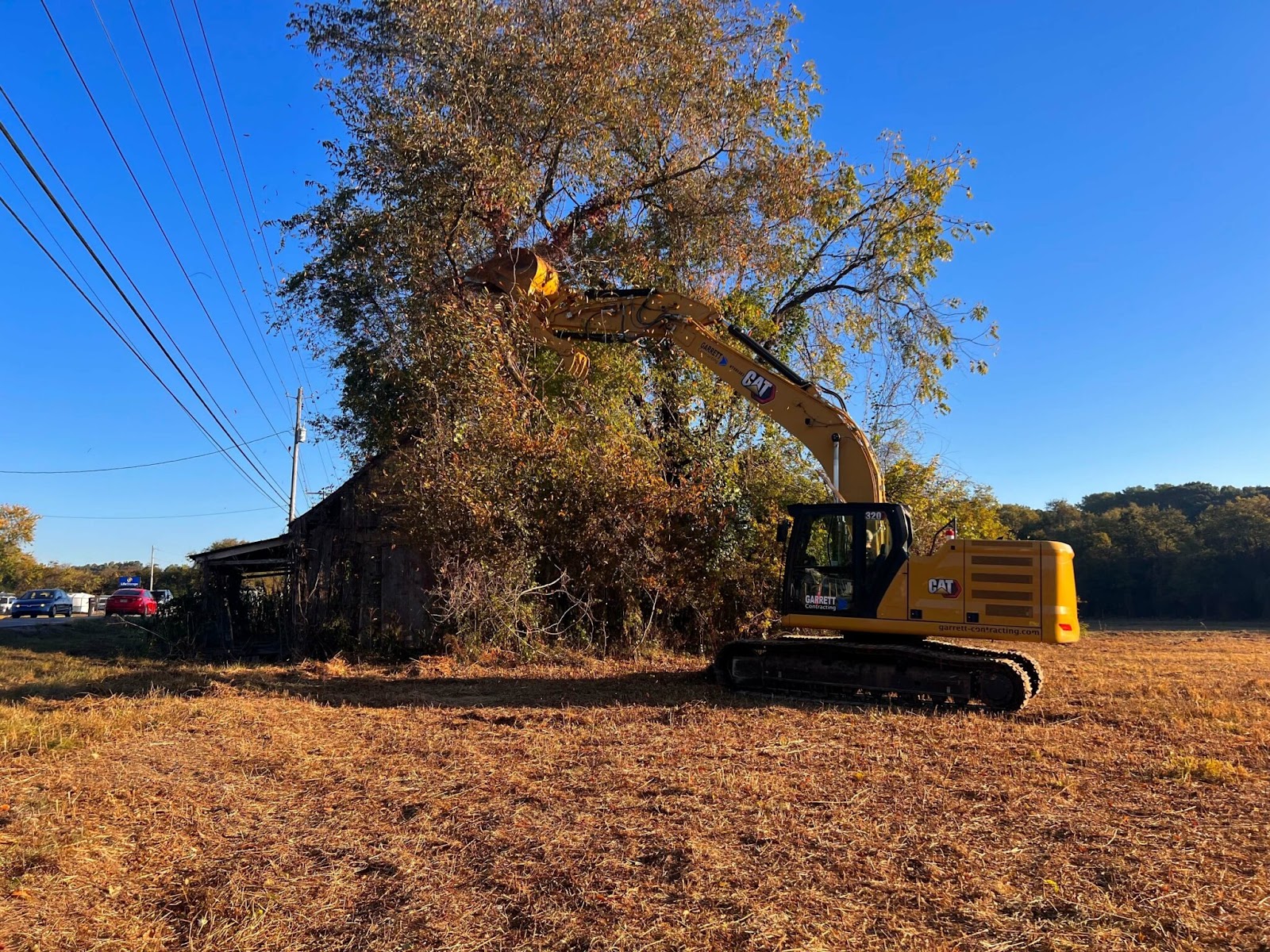 Land clearing Huntsville AL crew performing forestry mulching on residential lot